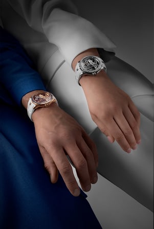 Man and woman wearing two Roger Dubuis Excalibur Monotourbillon Blue Hour and White gold
